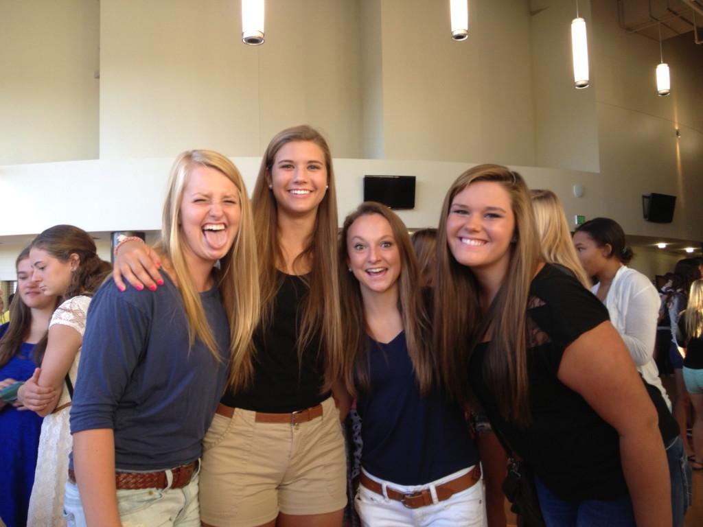 (L to R): Lauren Bashaw, Maddie Franks, Ally Parks, and Jordan Taffee share a senior moment and chuckle.