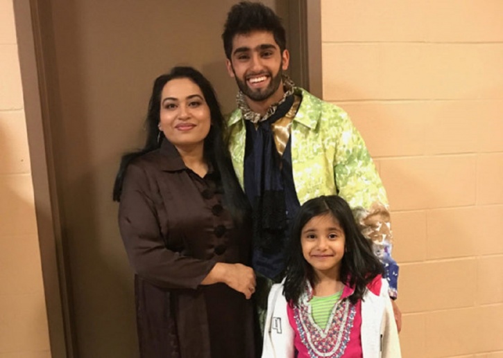 Hasher with his mother, Sadia, and sister Noor. 