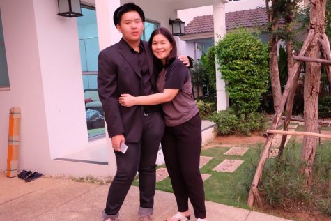 Poom Atiwetin finds new family at NHS while cherishing his birth family in Thailand