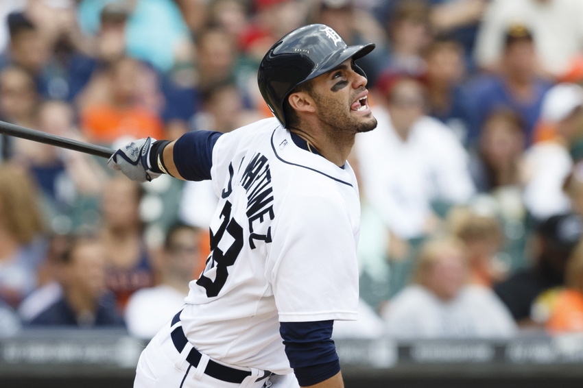 Jun 19, 2014; Detroit, MI, USA; Detroit Tigers left fielder J.D. Martinez (28) hits a home run in the fourth inning against the Kansas City Royals at Comerica Park. Mandatory Credit: Rick Osentoski-USA TODAY Sports