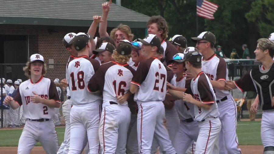 The Huskies celebrate on the field after winning the first ever state championship in school history. "We always talk about having a championship culture, it was important for us to get a championship to go with it," said senior Tyler Helgeson. "It was our goal the whole year." 
