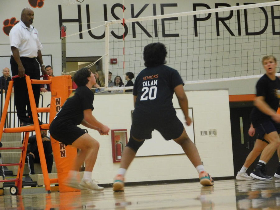 L to R, seniors Jackson Barnard and Turab Alam keep a watchful eye on the net during the powderpuff volleyball game. 