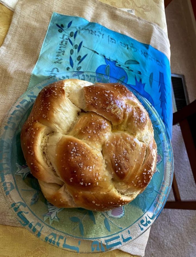 Mina makes challah, a special bread of the Jewish people, after school every Friday for Shabbat. Rosh Hashana, is the one time a year where challah is braided to be round, symbolizing the never-ending cycle of the years and seasons (the roundness of life). Pictured above is the challah Mina and her mom made for Rosh Hashana. 
