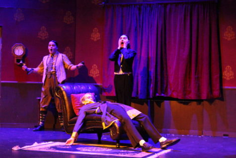  Josh Cavalli, playing Thomas Colleymore, and Vincent Brow, playing Perkins, expressing their shock at finding Charles Haversham, played by Garett Laabs, dead.