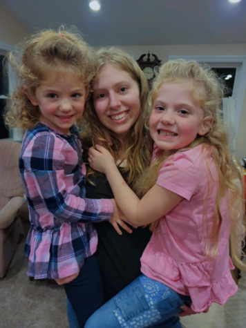Me (middle) holding my girls Kayleigh (right) and Sammie (left) in my arms.
