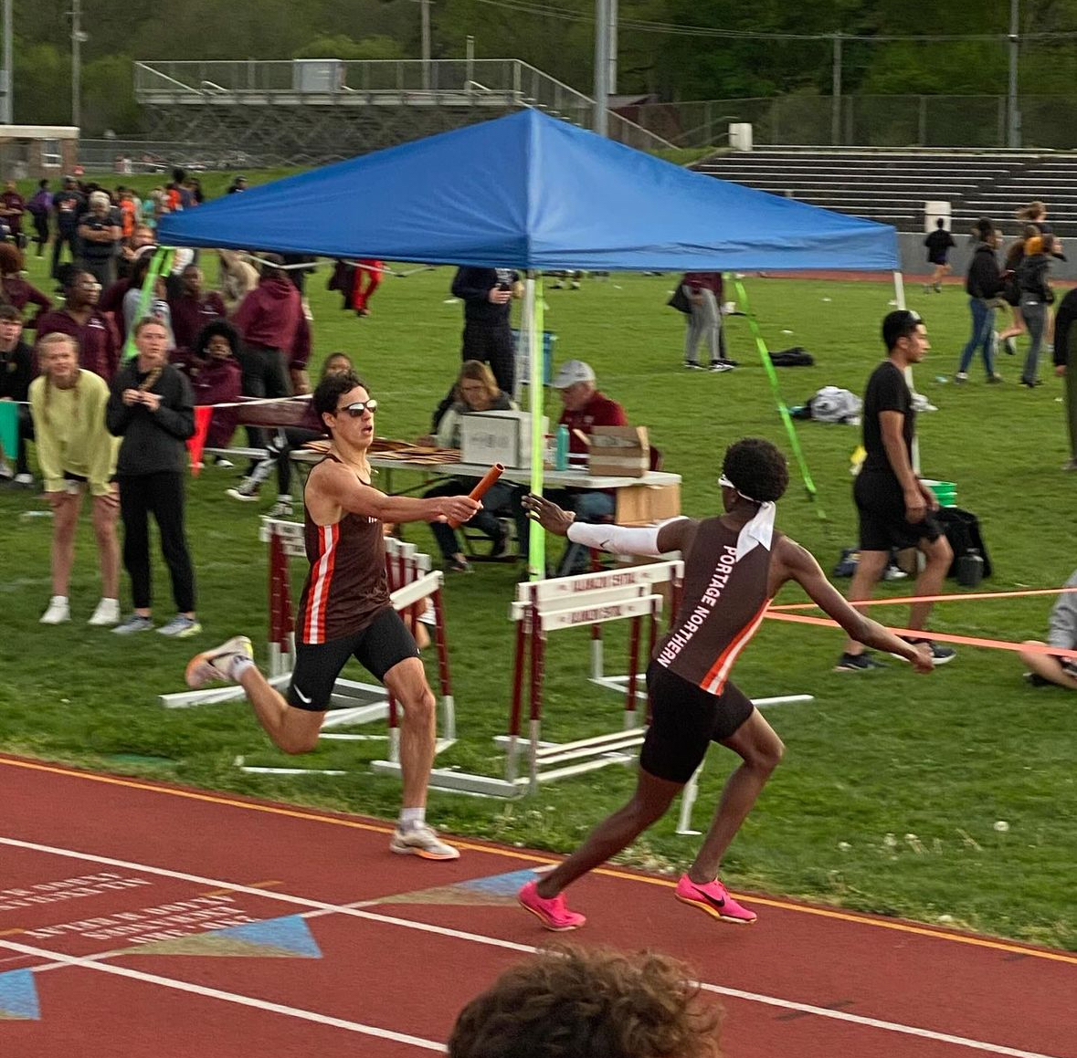 In a relay race, a single set of handoffs can make or break a team's chance to qualify for the state meet under the current model. This shouldn't be the case. Photo courtesy of Sandy Kocinski.